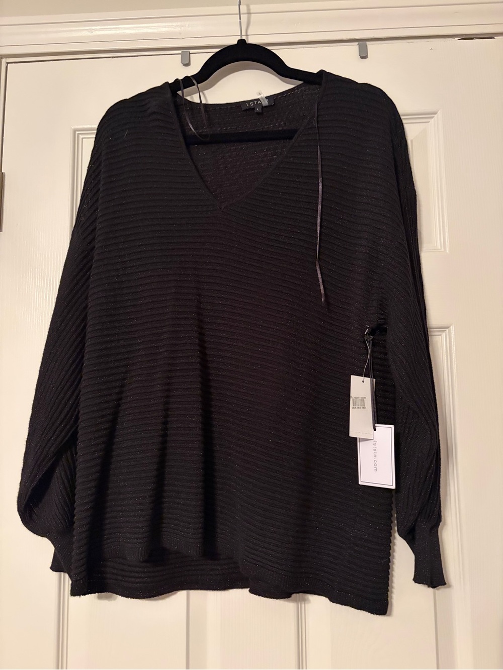 1. State Black Ribbed V-Neck Sweater